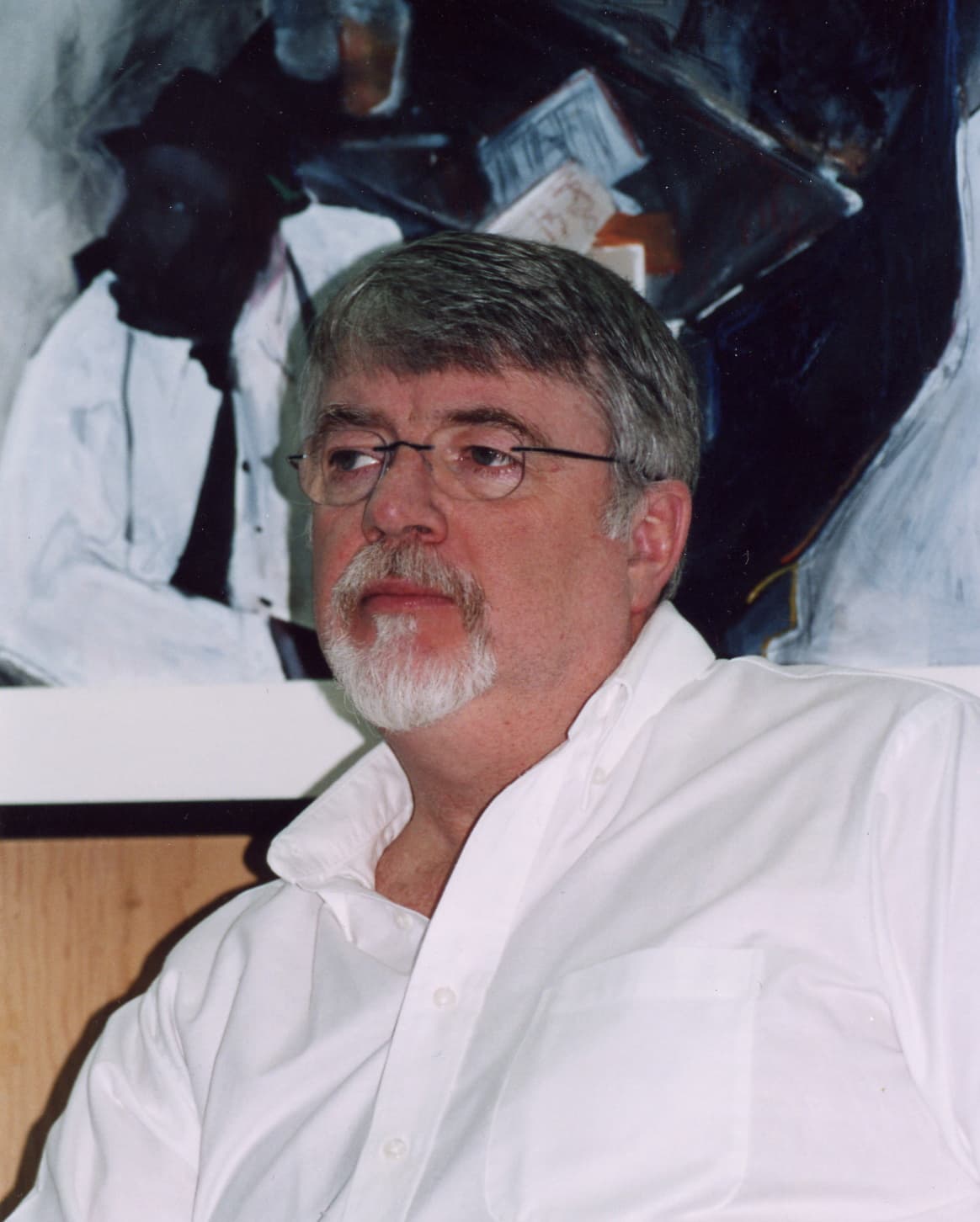 photo of artist, white shirt, beard